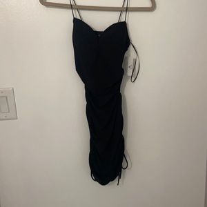 Tight fitting black dress